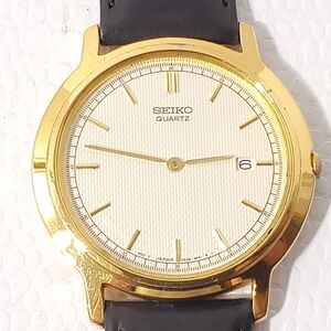 Vintage Seiko Men's Gold Tone Date Quartz Watch Black Leather Strap S Steel